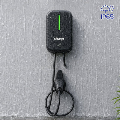 Chargr WP18 wallbox mounted on a wall in the rain - IP65