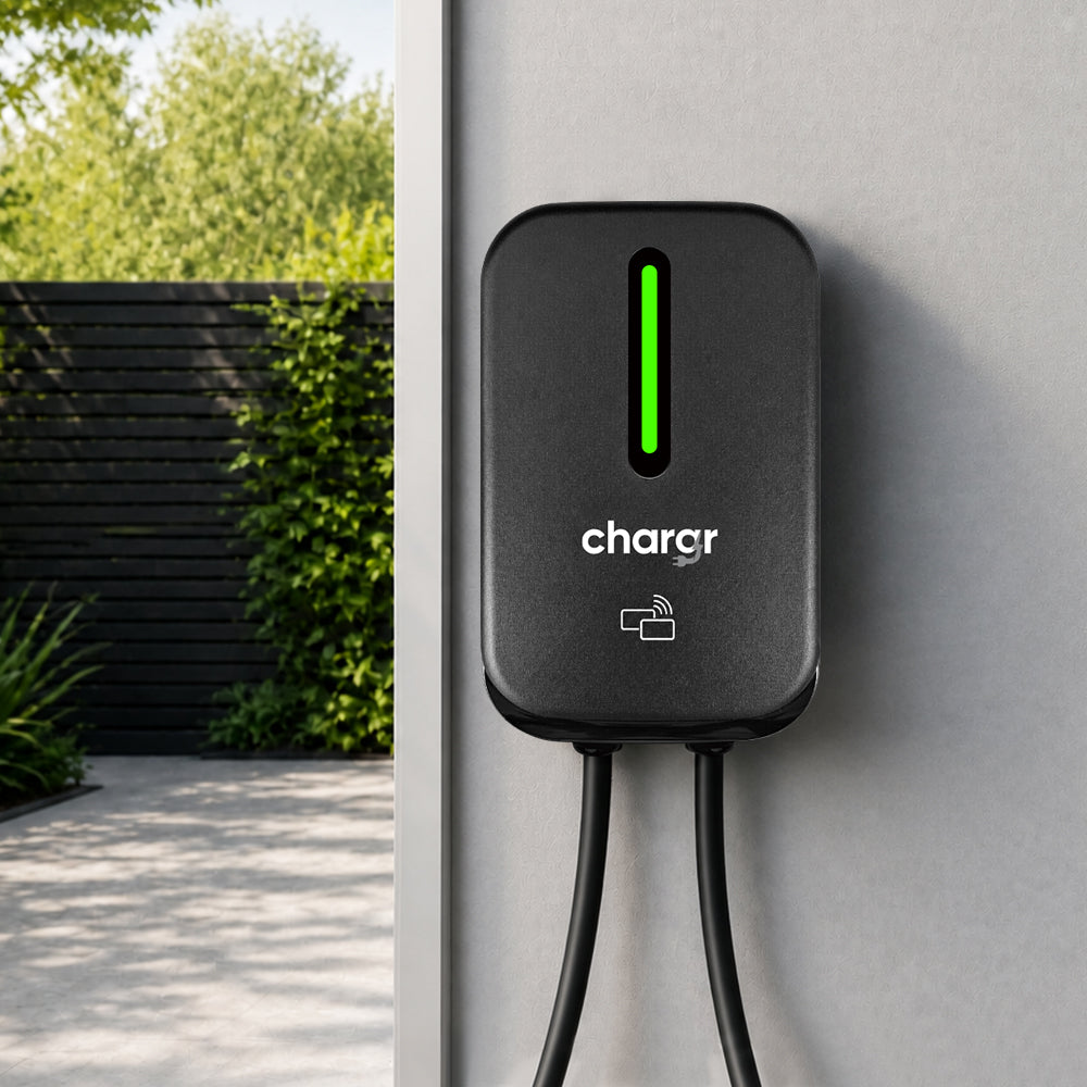 Chargr WP18 wallbox mounted on a house wall by a carport